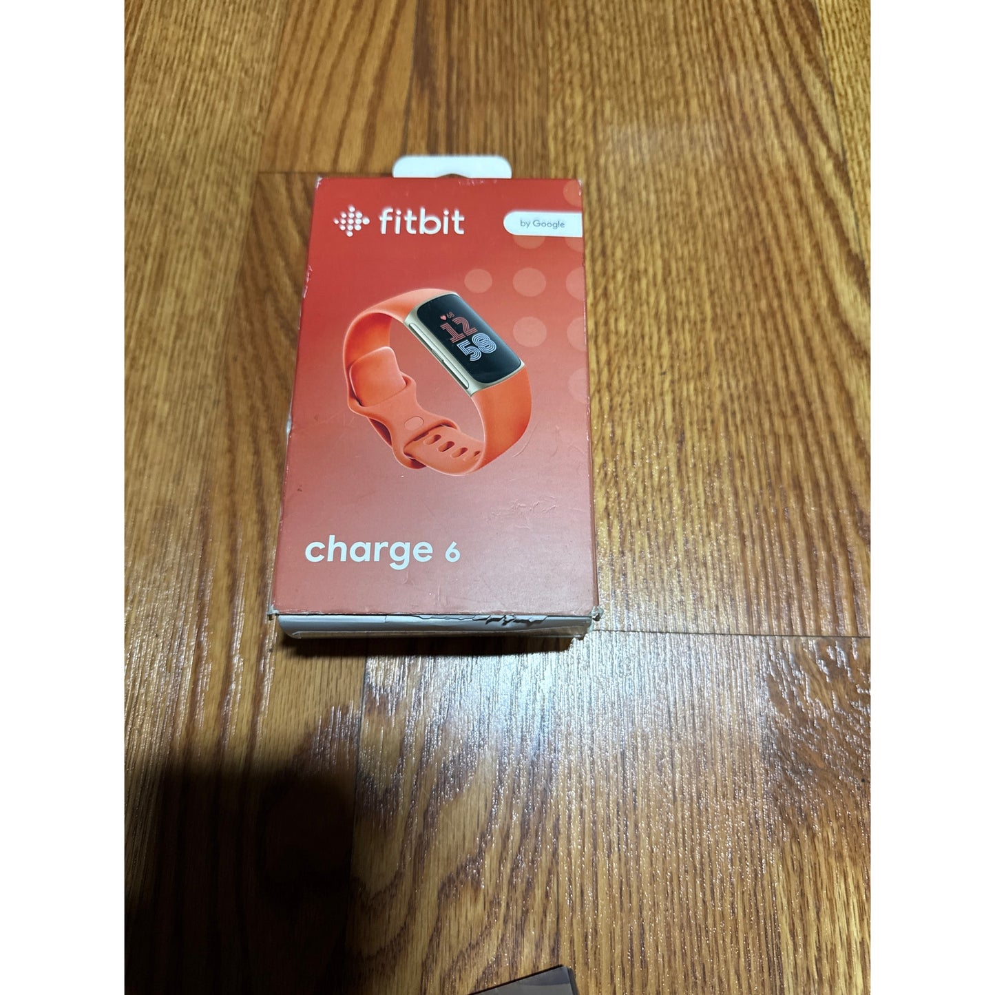 FITBIT Charge 6  - Orange band Silver - Open Box